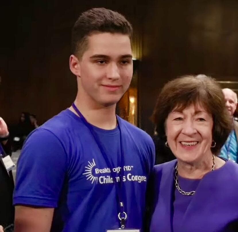 Aaron Prager in a Breakthrough T1D Children’s Congress shirt with Senator Susan Collins at a Senate hearing