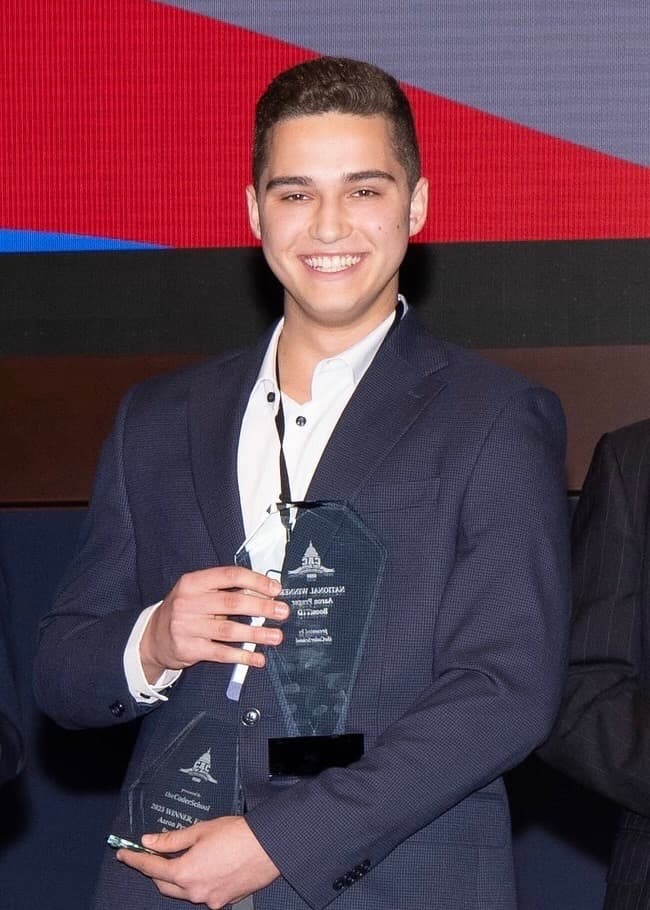 Aaron Prager accepting a National Top App award at the Congressional App Challenge #HouseOfCode event